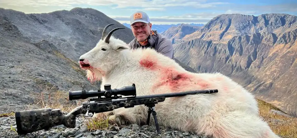 3G customer with a mountain goat taken in the high country